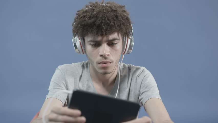 Young man using his media tablet PC