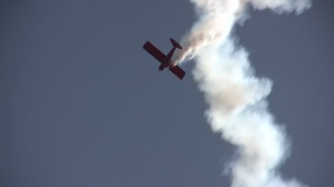STUART, FL - NOVEMBER 12: Skilled pilot shows amazing aerial stunts during the annual airshow in Stuart, Florida on November 12, 2011.