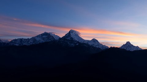Aerial view of Himalayas Nepal mountain peak. Time-lapse 4k video nature, background. Twilight sunrise and clear sky.