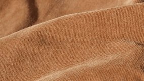 Velvet brown fine textile texture for clothing like trousers or shirts 4K 2160p 30fps UltraHD tilting footage - Corduroy maroon pants striped fabric slow tilt 3840X2160 UHD video