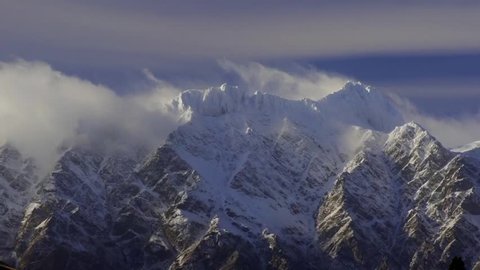 Time lapse of snow capped mountains, overlooking Queenstown 