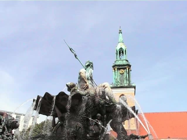 Neptune fountain and Church spire Berlin