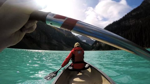 View of people Kayaking Lake Louise Alberta Canada