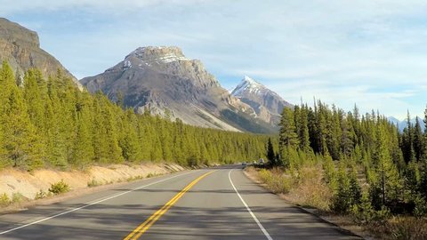 POV road trip driving through the scenic beauty of Icefields Parkway in Canada