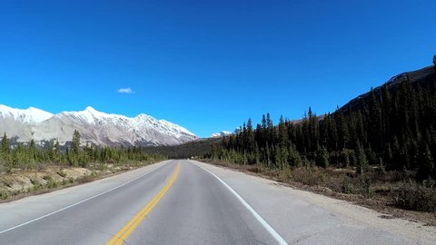POV road trip driving through Icefields Parkway in Canada