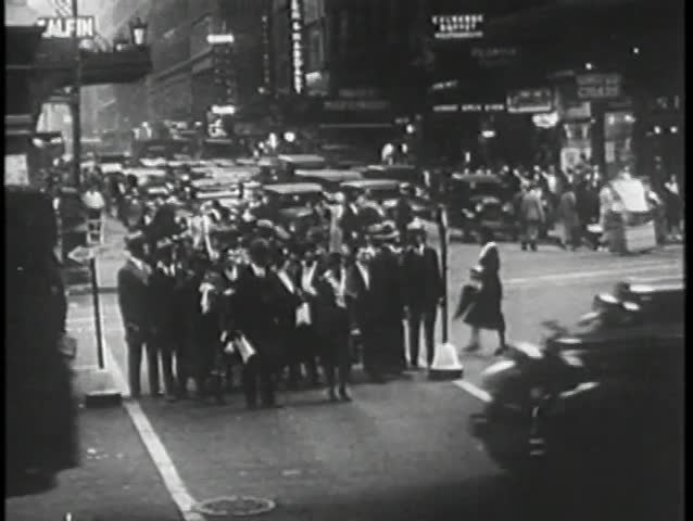 Pedestrians crossing street in New York City