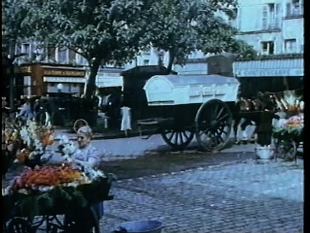 Montage - reenactment of 1930s street scene in Paris
