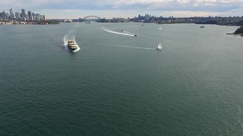 Aerial footage of Sydney Ferry in Sydney Harbour, featuring Sydney CBD, Sydney Skyine, City, Sydney Ferries (ferry), Parramatta River. 