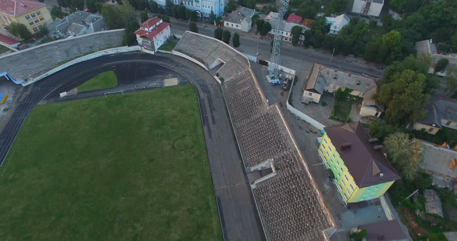 Aerial view of the old football stadium in the provincial town in summer