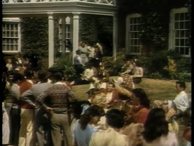 Students gathered in front of  building on college campus