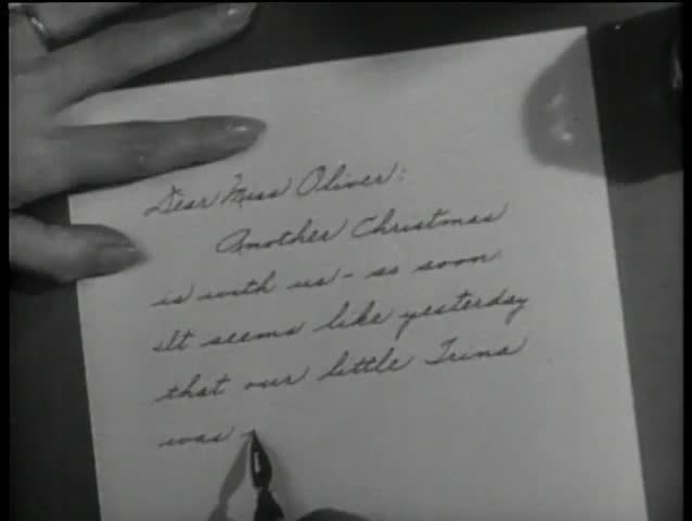 Close-up of hand writing note