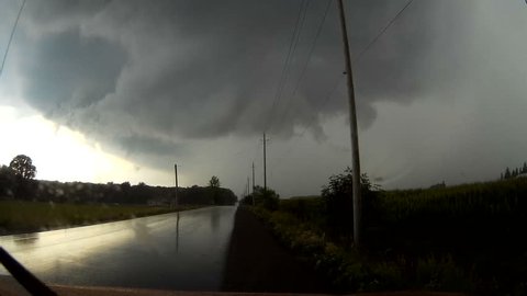 Waterloo, Ontario, Canada August 2016 POV dashcam driving into severe thunderstorm with wall cloud forming