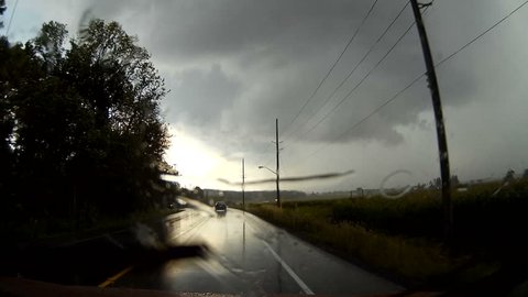 Waterloo, Ontario, Canada August 2016 POV dashcam driving into severe thunderstorm with wall cloud forming