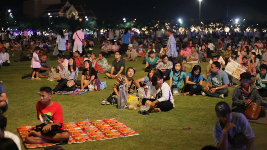 BANGKOK - DECEMBER 4: A crowd of Thai families attends the King's Birthday