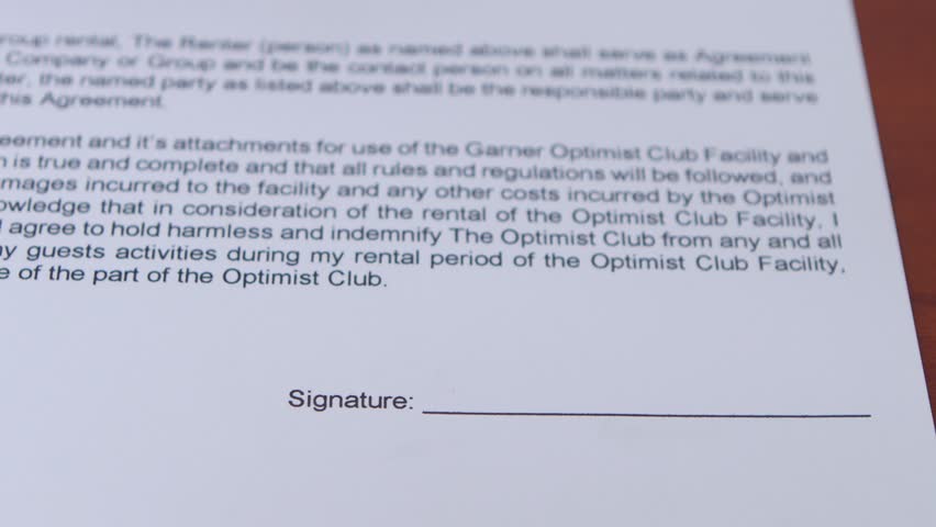 Girl puts a stamp on a document is denied. Close up