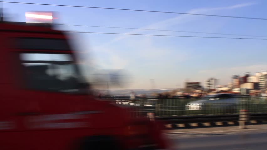 ISTANBUL - FEBRUARY 11: Fire engines from Istanbul Fire Brigade speed up Galata