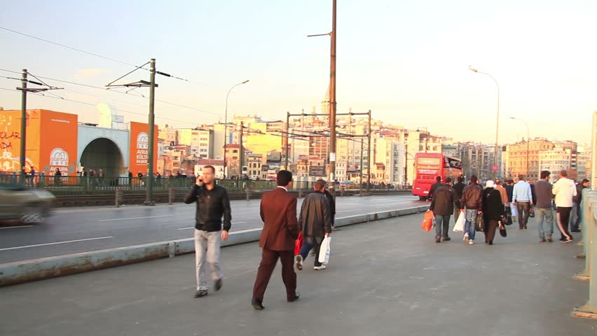 ISTANBUL - FEBRUARY 11: City tour bus at Historical Galata Bridge on February