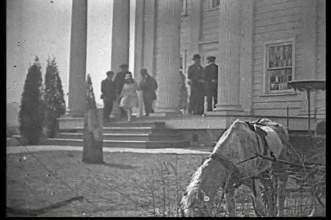 The farmer's daughter, her dad, sister and the city slicker leave church, ride home, blow off the farmhand (he\xEAs comically pulled away by a horse). (1910s)