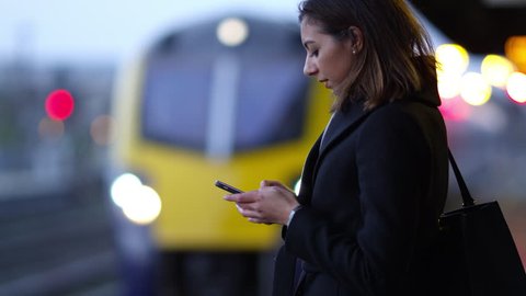 Businesswoman On Platform Waiting For Train Shot On R3D