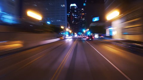 Hyperlapsed view from a car at night. POV. Hollywood, Los Angeles, United States. Perfect to represent concepts as autonomous driving, futuristic cityscape, city life, etc. 

