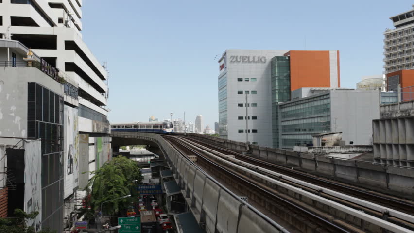 BANGKOK - NOVEMBER 27: A train arrives at the Sala Daeng BTS Station on November