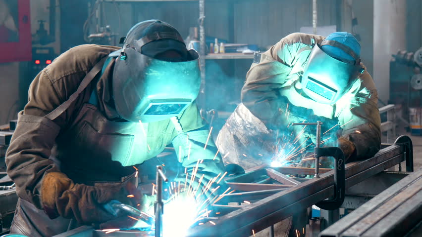 Welder Industrial automotive part in factory | Shutterstock HD Video #18573710