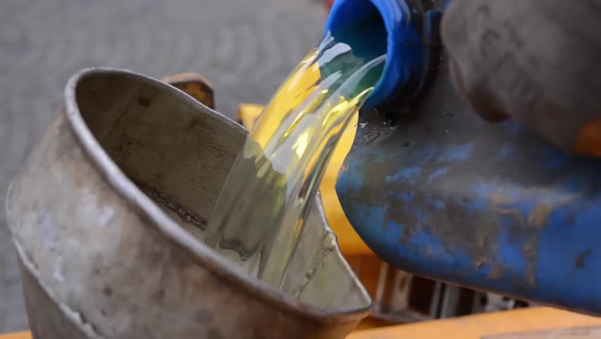 Man fueling with gasoline drilling equipment 3b
