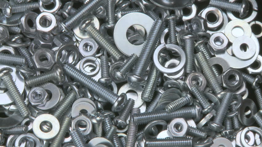 Counter clockwise rotation of a pile of nuts, bolts and washers