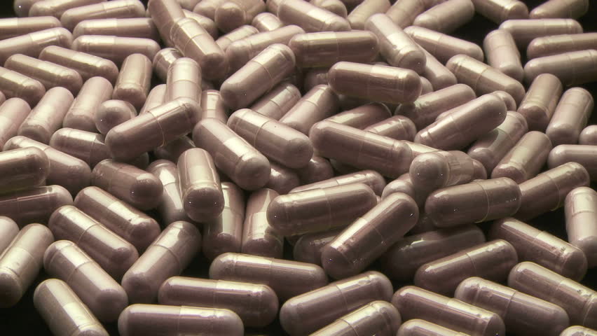 Drop into frame of medicine capsules