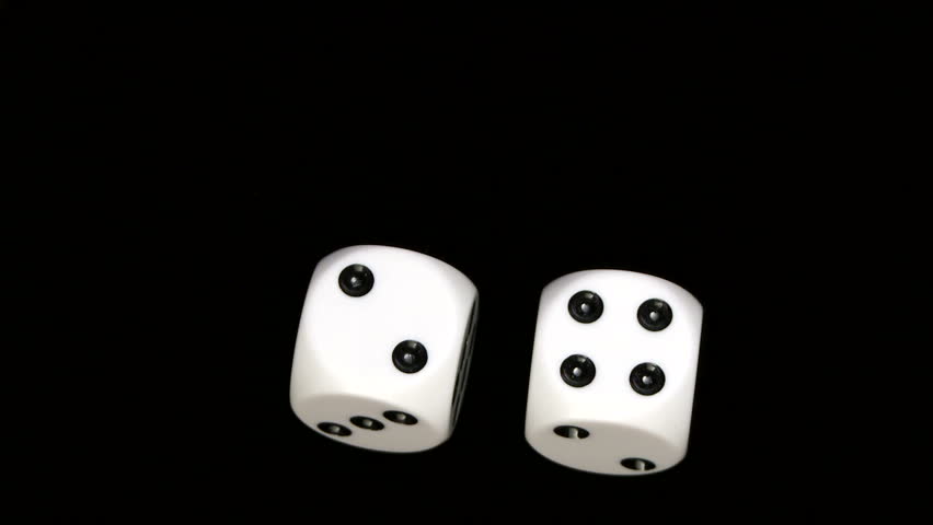 Rolling dice in slow motion, with numbers two and four