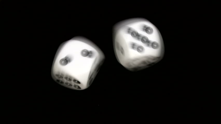 Rolling dice in slow motion, with numbers two and five