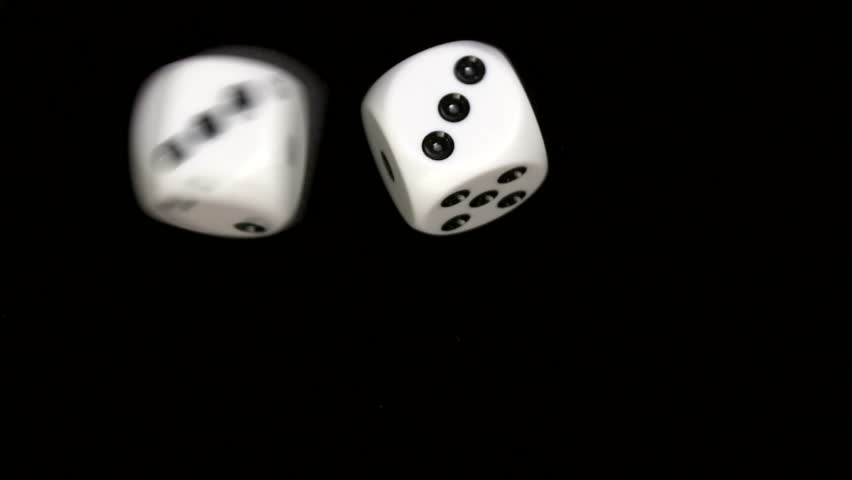 Rolling dice in slow motion, with numbers three and three
