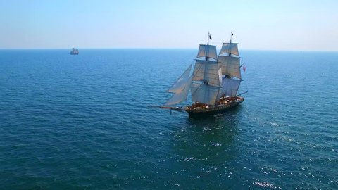 Tall ship at sea, majestic vessel sailing in open waters.
