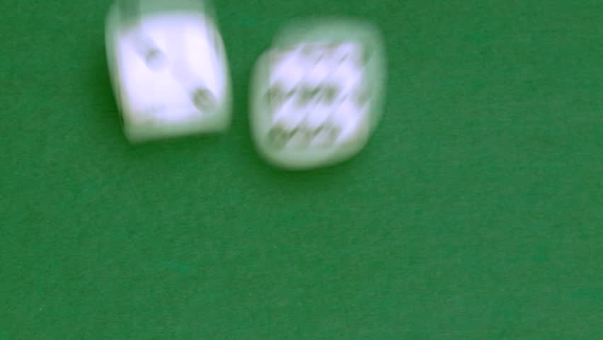 Rolling dice in slow motion with numbers two and five