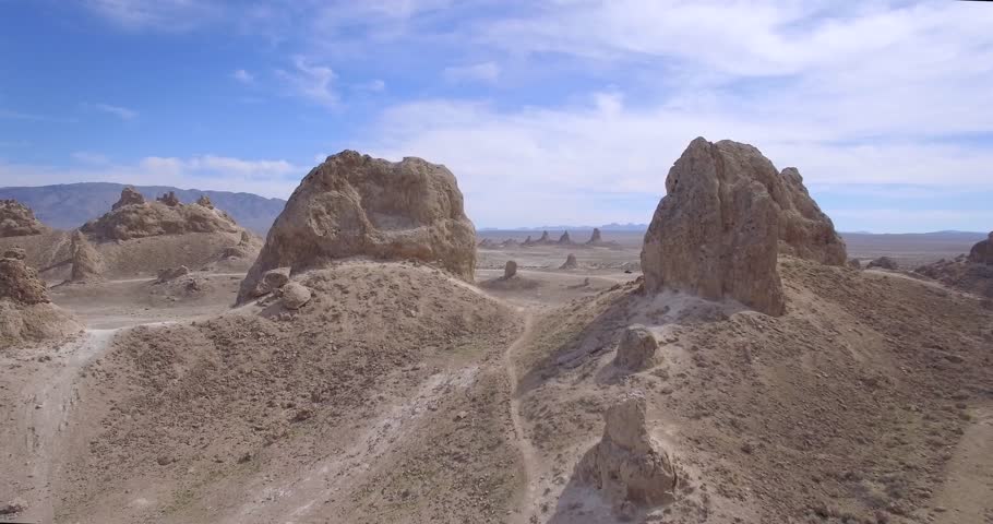 Flight Desert Rock Structures / Multiple clips of flying by rock structures in the desert.