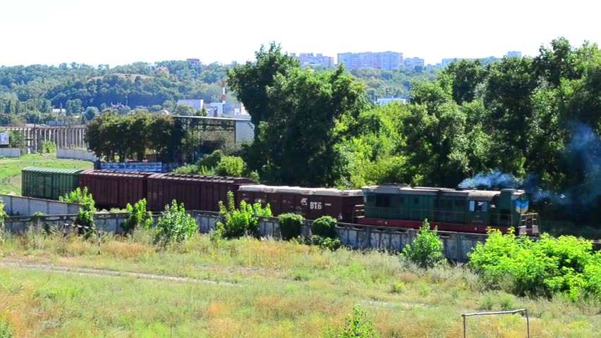 The train moving away from station 