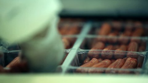 Sausages on a conveyor