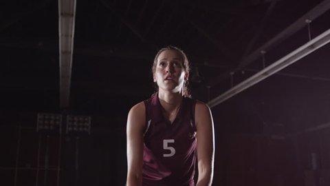 Slow-Motion  --  Female Volleyball Player --  Hits the ball numerous times  --  Hand held shot
