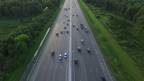 Aerial View of Traffic on a Motorway Ring Road Through a Wooded Area in Moscow City, Russia