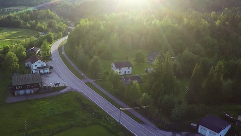 Aerial Shot of Coutry Road Surrounded by Forest