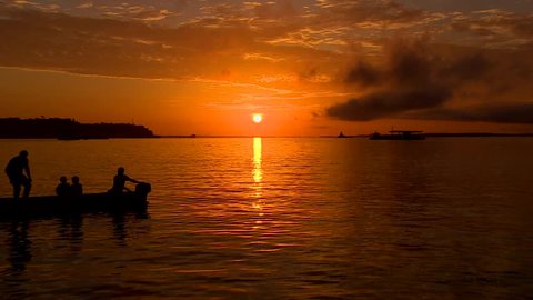 Sunset with boat on the river, Manaus, Brazil 2015