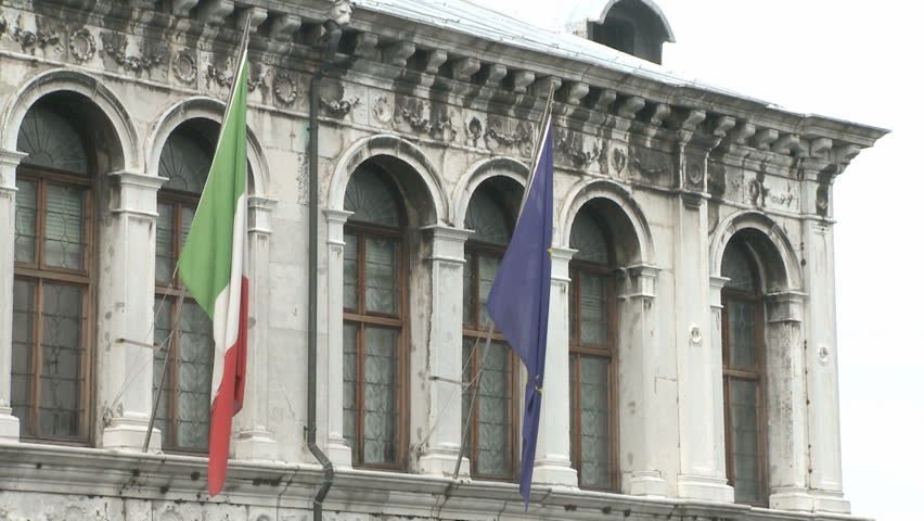 Flags on a facade in Venice