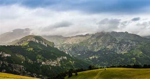 4K, Time Lapse, Godrays And Rain Over French Mountainrange