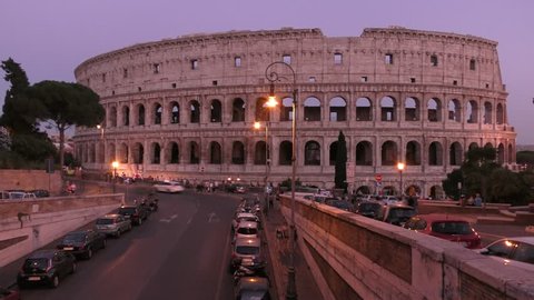 The Colosseum, Rome, Italy, sunset, time lapse. Probably the most impressive building of the Roman empire. Originally known as the Flavian Amphitheater, it was the largest building of the era.