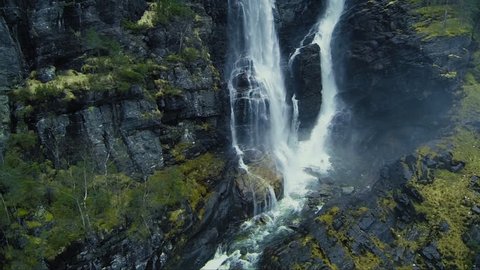 Aerial Shot of Waterfall in Rocky Mountains