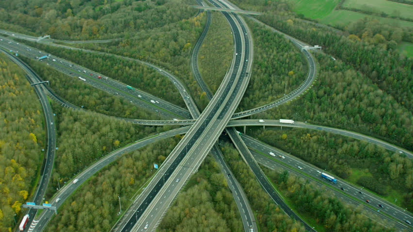 Aerial view of M25 motorway system outside London UK Royalty-Free Stock Footage #18715724