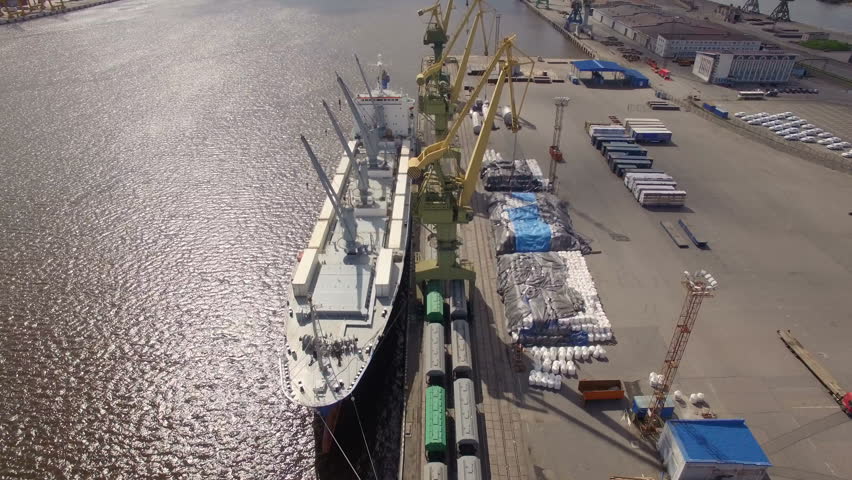 aerial view of the seaport with cranes, ships, containers and cargo in Saint Petersburg, Russia