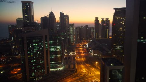 Panning across the new skyline of the West Bay central financial district of Doha, at sunrise, Doha. Qatar, Middle East