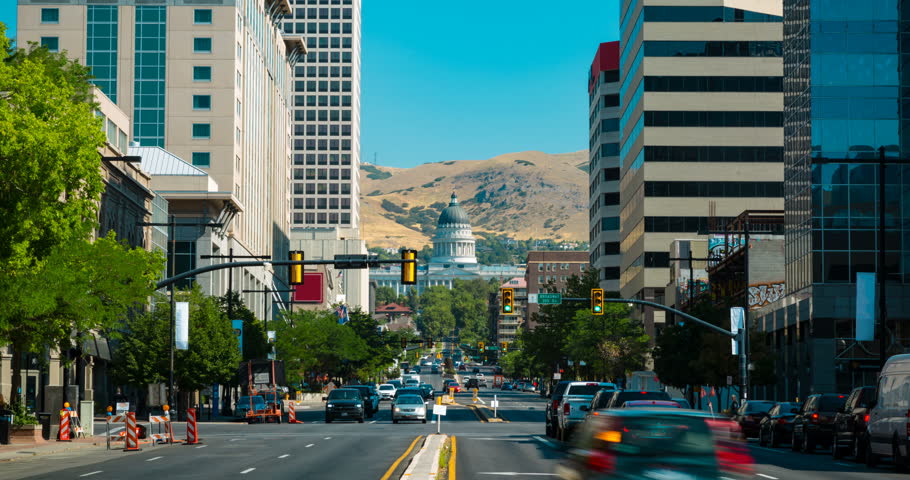 Downtown Salt Lake City traffic with the state capitol in the background