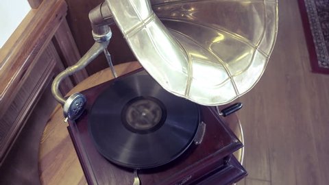 old retro gramophone turning, top view